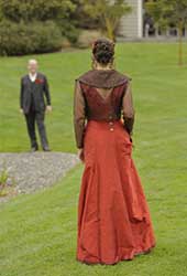 long, glamorous, red wedding dress from the back