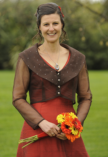 Long, bold, red wedding dress by Catherine Shaw